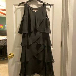 Black asymmetrical layered dress with rhinestone shoulder accent, size 8